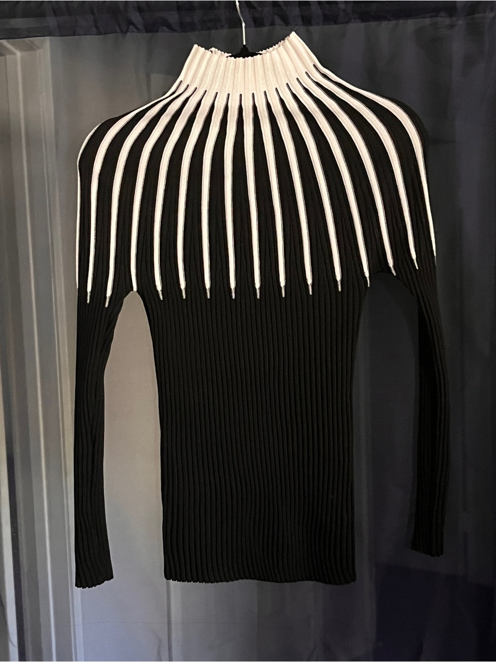 Black Ribbed Sweater with White Radiant Neck Detail